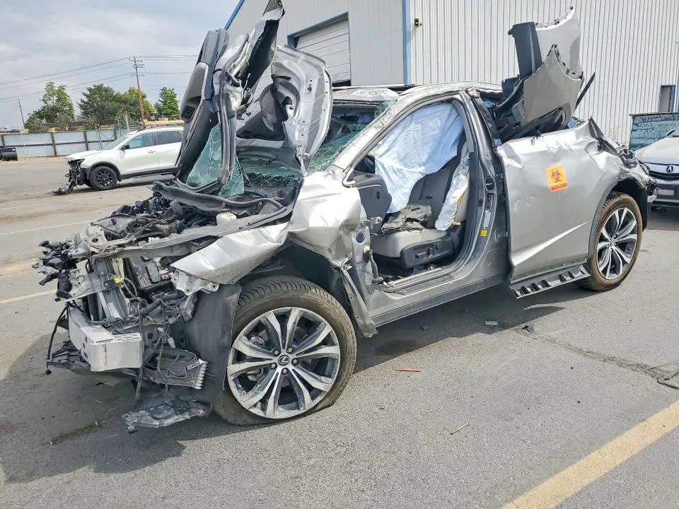 2022 Lexus RX VIN 2T2HZMDA0NC355908 фото 1