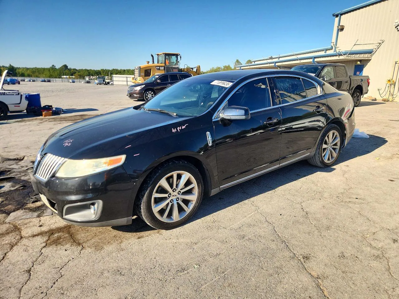 2009 Lincoln Mks VIN 1LNHM93R79G605784 фото 1