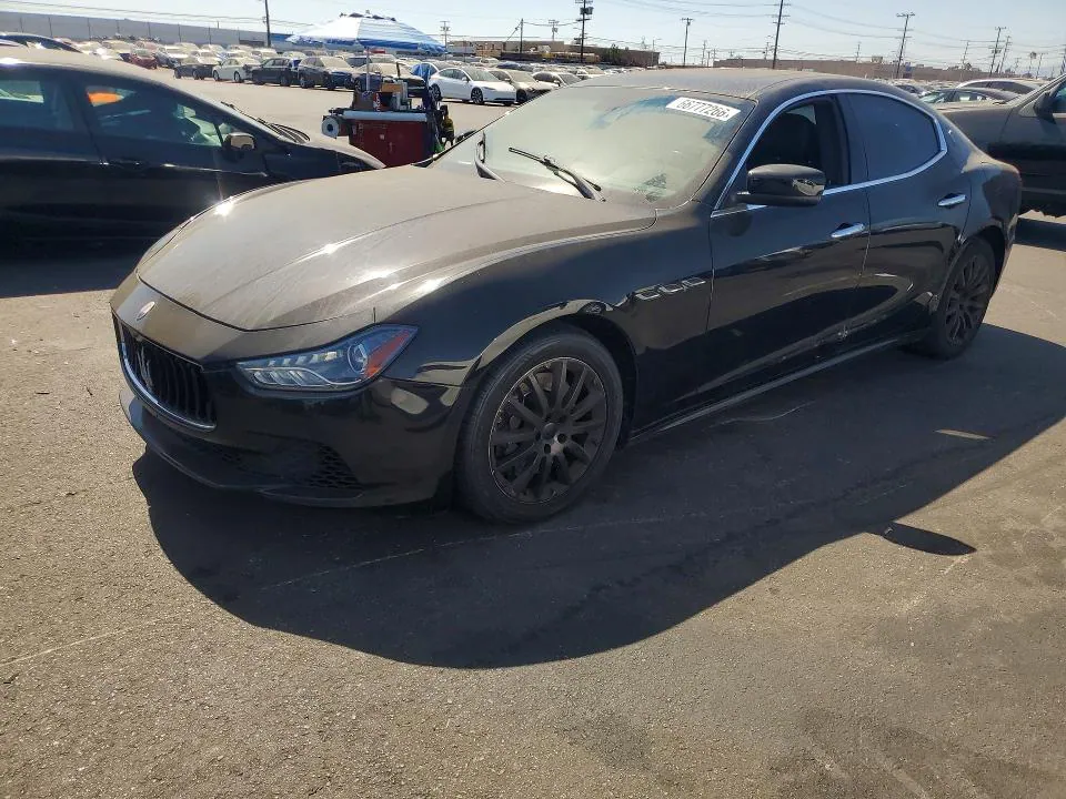 2014 Maserati Ghibli VIN ZAM57RTA7E1117842 фото 1