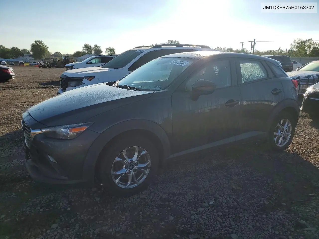 JM1DKFB75H0163702 Mazda CX-3 2017 — повреждение Подтопление, фото до ремонта