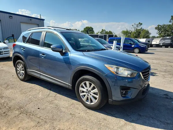 JM3KE4CY1G0784015 — 2016 Mazda CX-5, фото 4 с аукциона Copart, Град