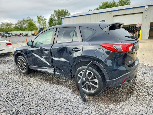 JM3KE4DYXG0770743 — 2016 Mazda CX-5, фото 2 с аукциона Copart, Боковая часть