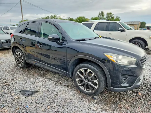 JM3KE4DYXG0770743 — 2016 Mazda CX-5, фото 4 с аукциона Copart, Боковая часть