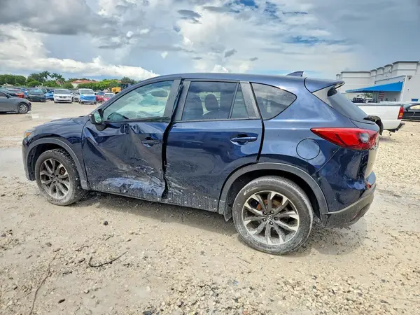 JM3KE4DY2G0629956 — 2016 Mazda CX-5, фото 2 с аукциона Copart, Боковая часть
