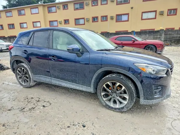 JM3KE4DY2G0629956 — 2016 Mazda CX-5, фото 4 с аукциона Copart, Боковая часть