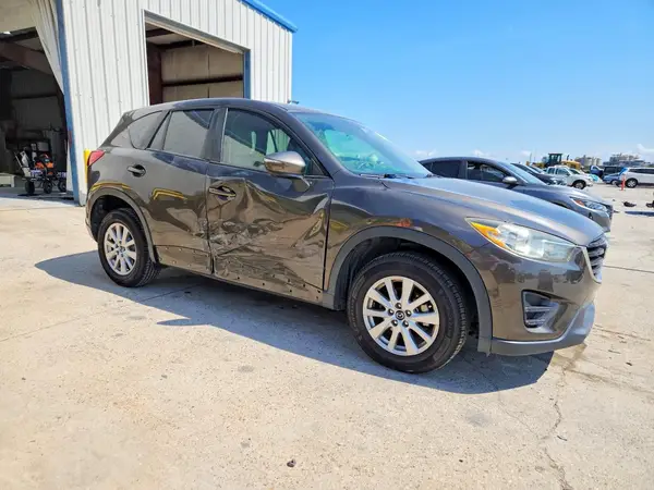 JM3KE2BY3G0642576 — 2016 Mazda CX-5, фото 4 с аукциона Copart, Боковая часть