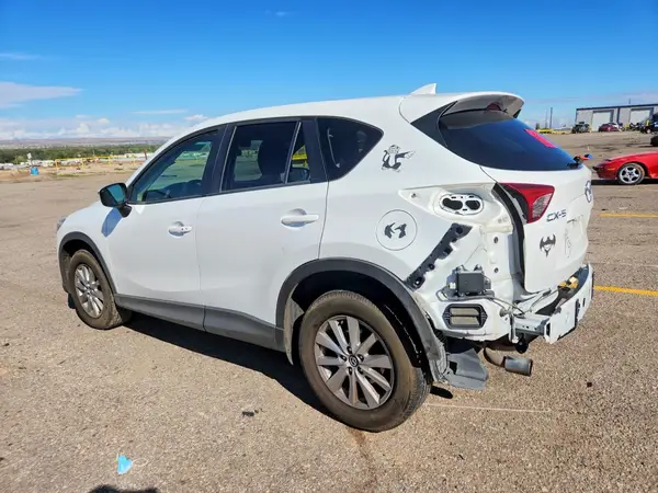 JM3KE2CY4G0849704 — 2016 Mazda CX-5, фото 2 с аукциона Copart, Задняя часть
