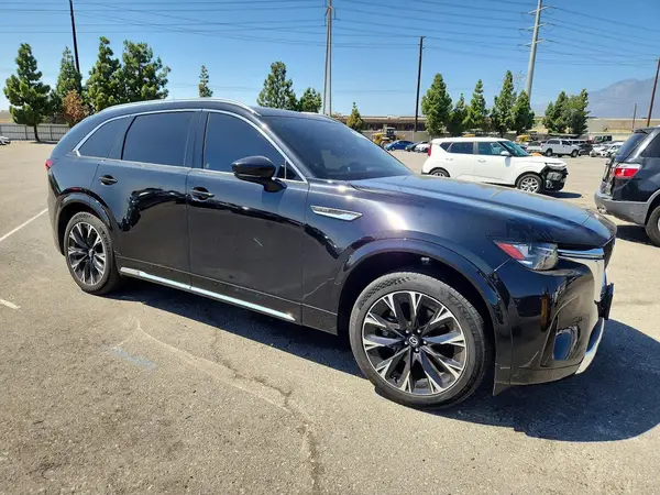 JM3KKEHC5R1131860 — 2024 Mazda CX-90, фото 4 с аукциона Copart, Боковая часть