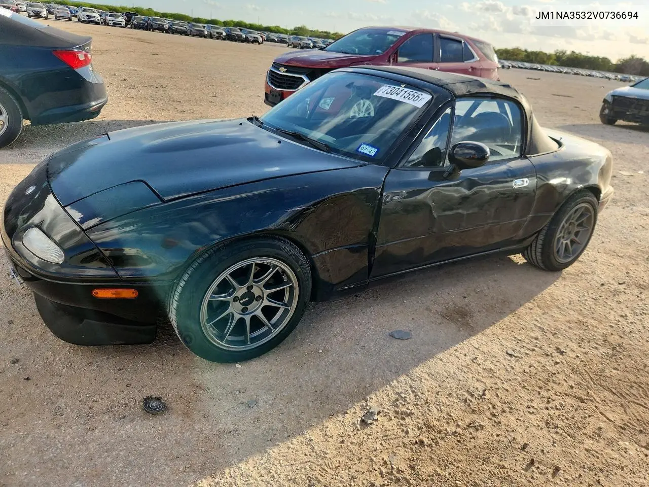 JM1NA3532V0736694 Mazda MX-5 1997 — повреждение Сторона, фото до ремонта