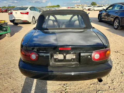 JM1NA3532V0736694 — 1997 Mazda MX-5, Сторона, фото до ремонта