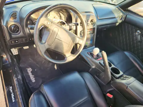JM1NA3532V0736694 — 1997 Mazda MX-5, фото 8 с аукциона Copart, Сторона