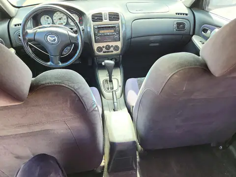 JM1BJ245221478148 — 2002 Mazda Protege, фото 8 с аукциона Copart, Мелкие вмятины и царапины