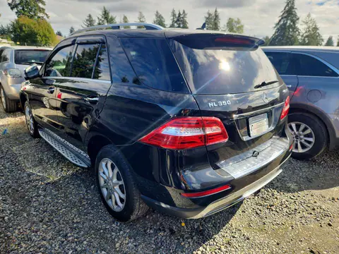 2015 Mercedes-Benz ML VIN 4JGDA5HB3FA548588 фото 2