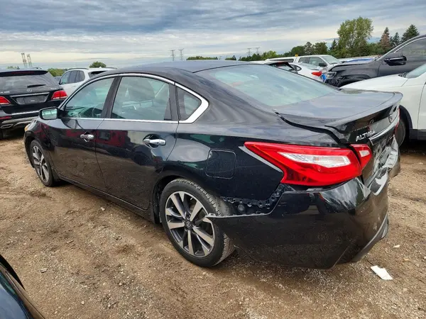 1N4AL3AP0GN319331 — 2016 Nissan Altima, фото 2 с аукциона Copart 13.10.2026, Задняя часть