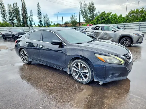 1N4BL3AP6GC224191 — 2016 Nissan Altima, фото 4 с аукциона Copart 30.09.2026, Задняя часть