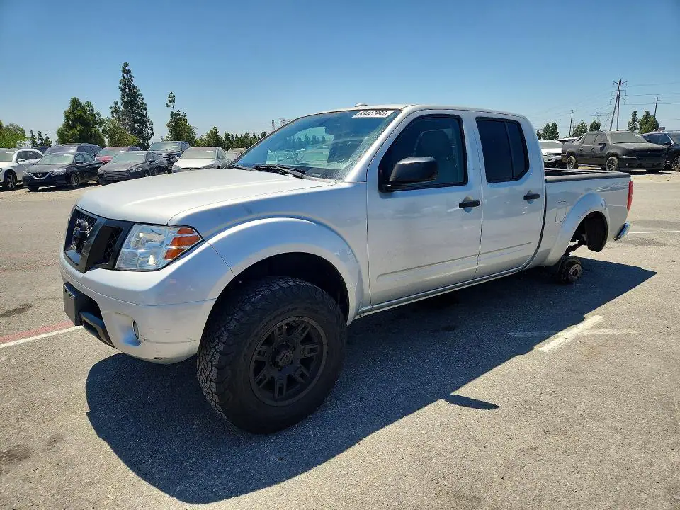 1N6AD0FR8DN717380 Nissan Frontier 2013 — повреждение Мелкие вмятины и царапины, фото до ремонта