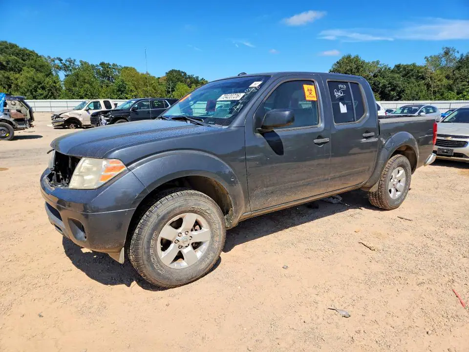 1N6AD0ER3DN748134 Nissan Frontier 2013 — повреждение Мелкие вмятины и царапины, фото до ремонта