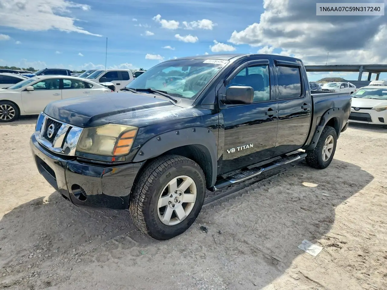 2009 Nissan Titan Xe VIN 1N6AA07C59N317240 фото 1