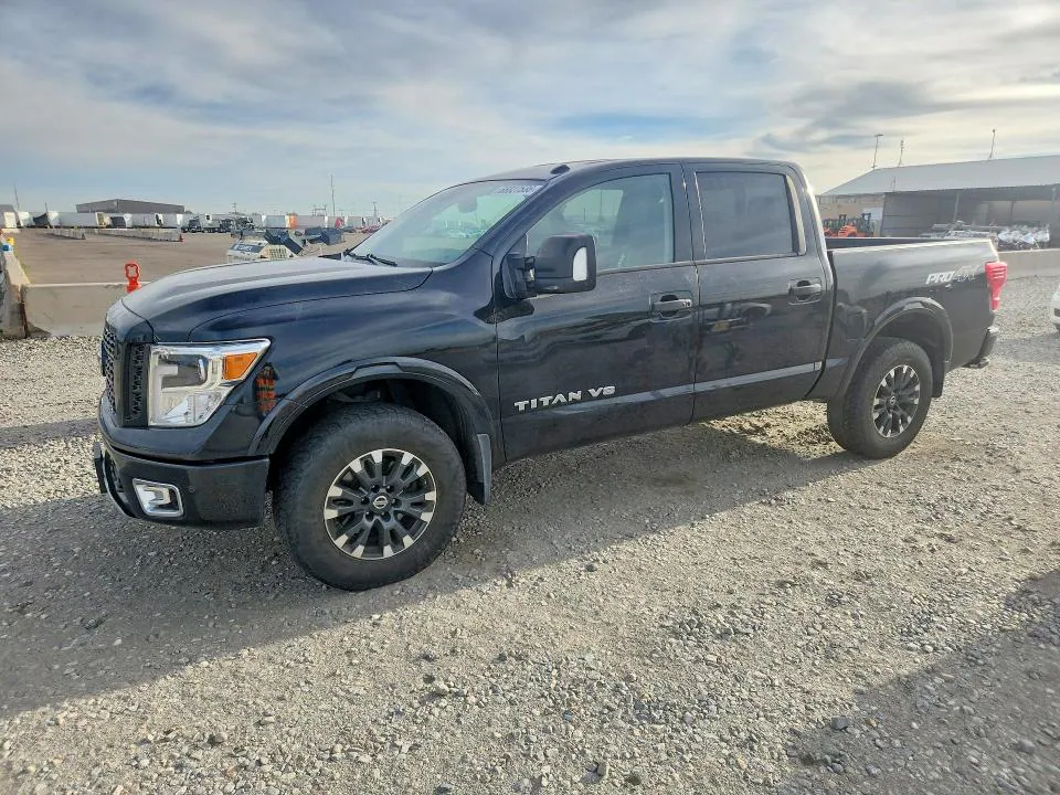 2018 Nissan Titan VIN 1N6AA1E52JN537420 фото 1