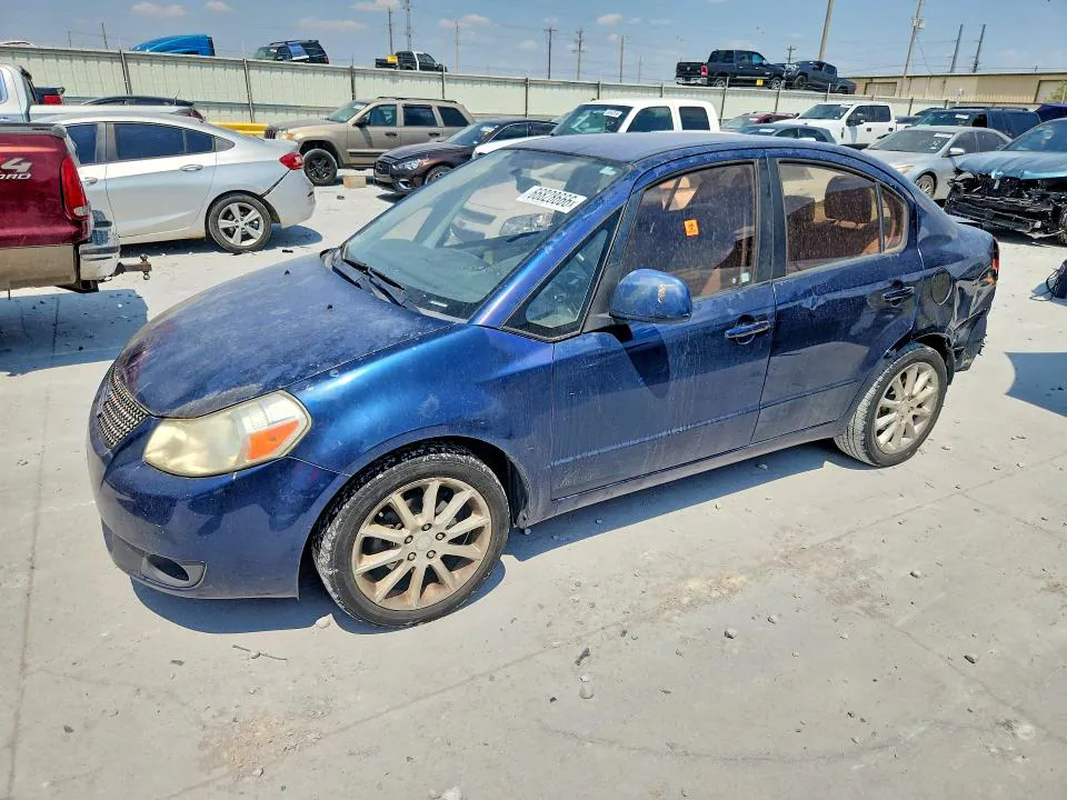 2011 SUZUKI SX4 VIN JS2YC5A21B6301003 фото 1