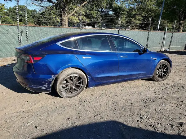 5YJ3E1EA4JF154123 — 2018 Tesla Model 3, фото 3 с аукциона Copart, Задняя часть