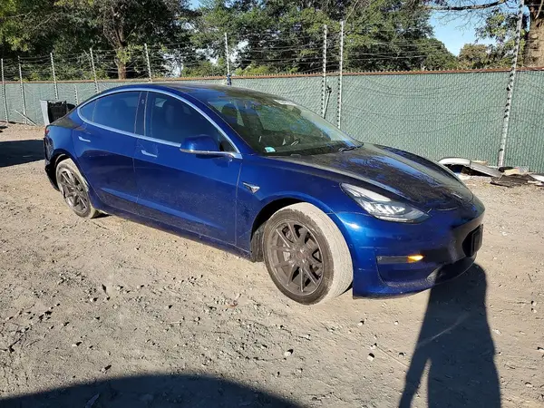5YJ3E1EA4JF154123 — 2018 Tesla Model 3, фото 4 с аукциона Copart, Задняя часть