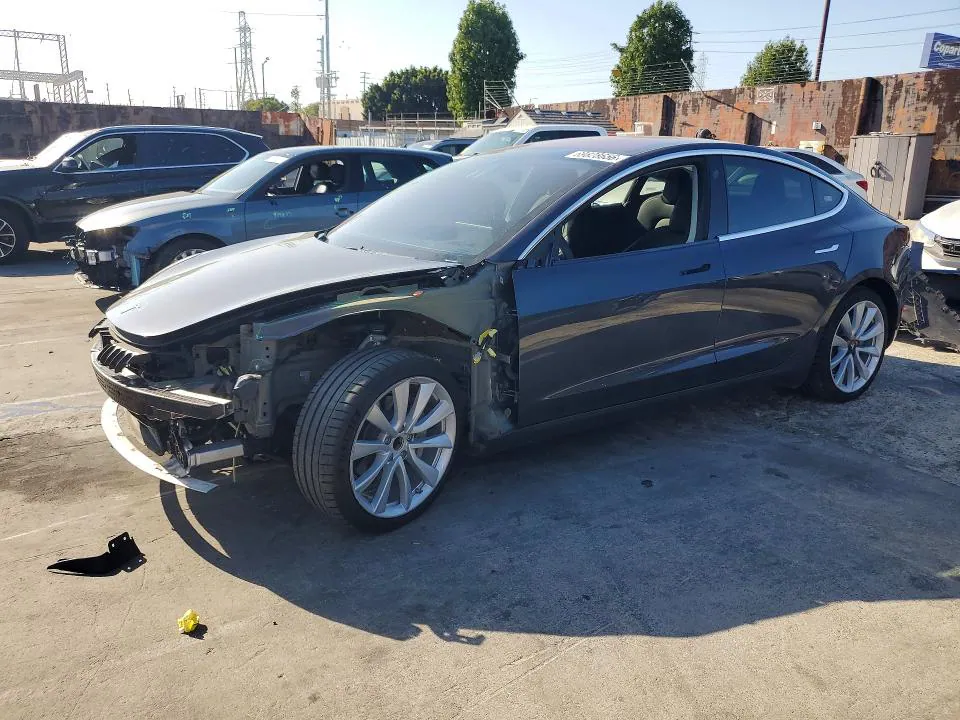 2018 Tesla MODEL 3 VIN 5YJ3E1EA9JF011992 фото 1