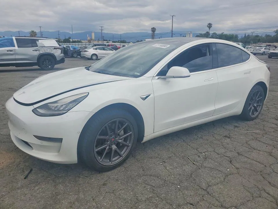 2019 Tesla MODEL 3 VIN 5YJ3E1EAXKF504081 фото 1