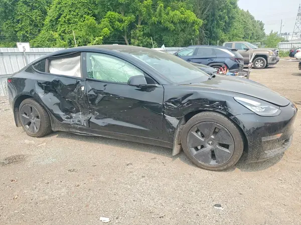 5YJ3E1EAXNF237061 — 2022 Tesla Model 3, фото 4 с аукциона Copart 01.10.2026, Боковая часть