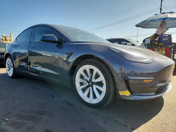 5YJ3E1EA0NF324886 — 2022 Tesla Model 3, фото 4 с аукциона Copart, Боковая часть