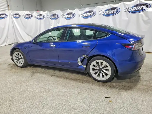 5YJ3E1EB7NF305163 — 2022 Tesla Model 3, фото 2 с аукциона Copart 30.09.2026, Боковая часть