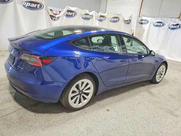 5YJ3E1EB7NF305163 — 2022 Tesla Model 3, фото 3 с аукциона Copart 30.09.2026, Боковая часть