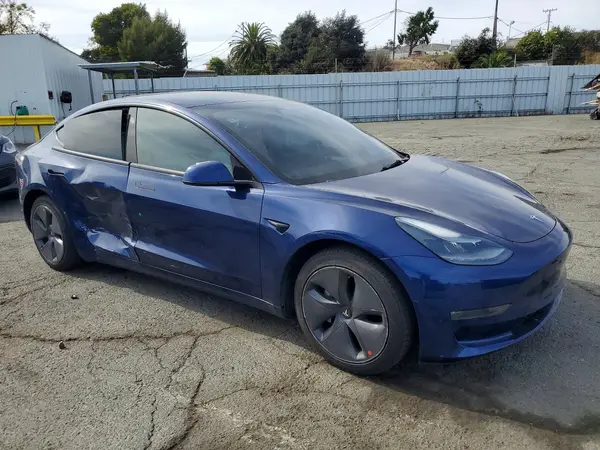 5YJ3E1EB1NF136600 — 2022 Tesla Model 3, фото 4 с аукциона Copart, Боковая часть