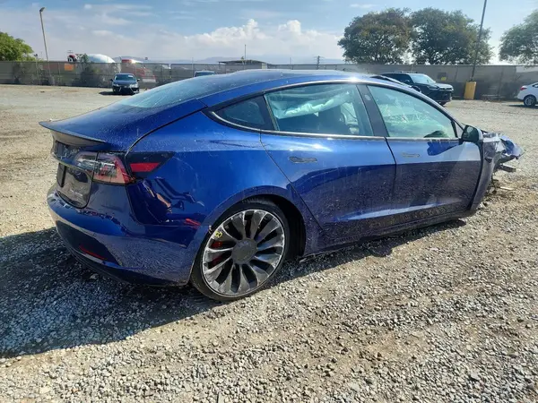 5YJ3E1EC6NF169584 — 2022 Tesla Model 3, фото 3 с аукциона Copart, Повреждения со всех сторон