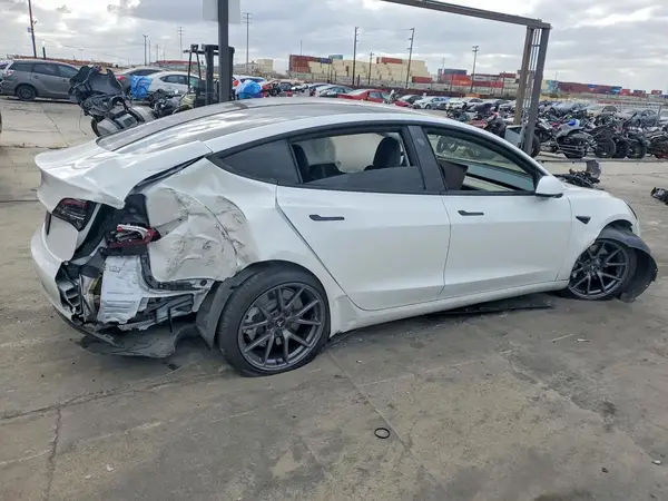 5YJ3E1EA9PF518142 — 2023 Tesla Model 3, фото 3 с аукциона Copart, Задняя часть