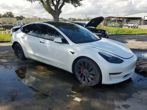 5YJ3E1EC8PF499813 — 2023 Tesla Model 3, фото 4 с аукциона Copart, Задняя часть