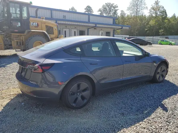 5YJ3E1EAXPF695444 — 2023 Tesla Model 3, фото 3 с аукциона Copart 08.10.2026, Боковая часть