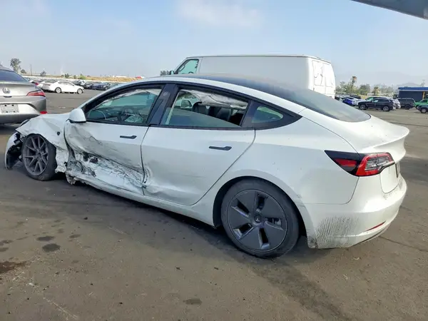 5YJ3E1EA8PF686399 — 2023 Tesla Model 3, фото 2 с аукциона Copart, Боковая часть