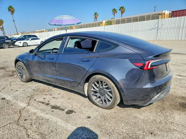 5YJ3E1EA4RF744348 — 2024 Tesla Model 3, фото 2 с аукциона Copart, Боковая часть