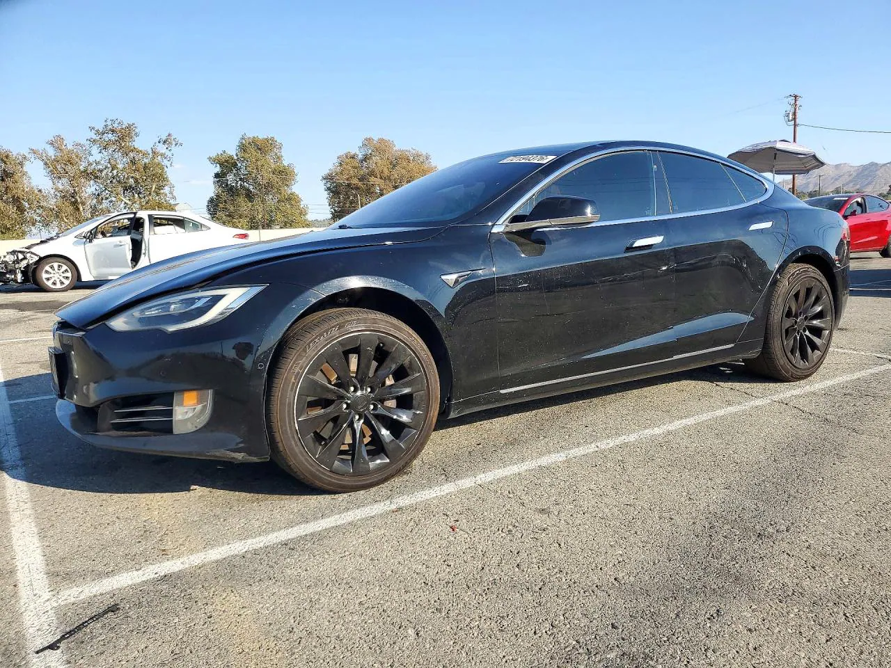 2017 Tesla Model S VIN 5YJSA1E11HF231127 фото 1