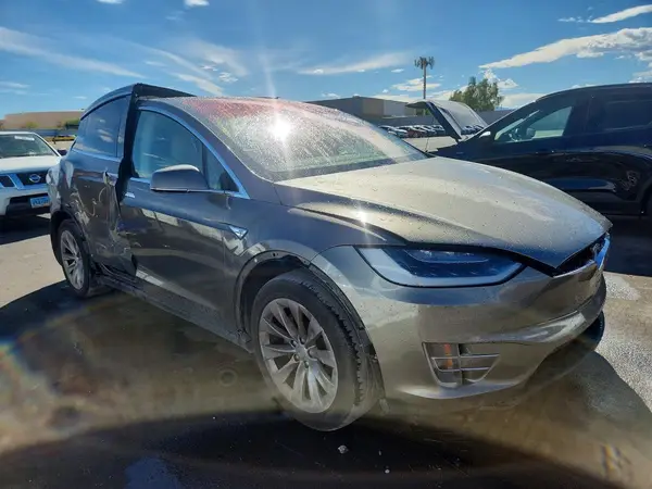 5YJXCBE22GF016594 — 2016 Tesla Model X, фото 4 с аукциона Copart 29.09.2026, Боковая часть
