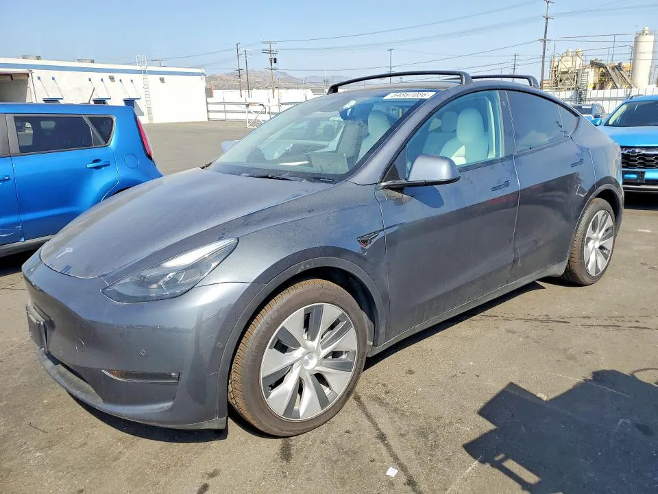 2022 Tesla Model Y VIN 7SAYGAEE1NF558671 фото 1