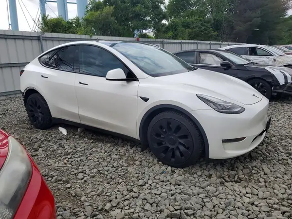 7SAYGDEE9PA047744 — 2023 Tesla Model Y, фото 4 с аукциона Copart 05.10.2026, Задняя часть