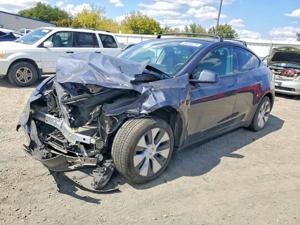 2023 Tesla Model Y VIN 7SAYGAEE2PF865561 фото 1