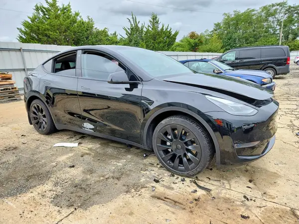 7SAYGAEEXPF605151 — 2023 Tesla Model Y, фото 4 с аукциона Copart, Боковая часть