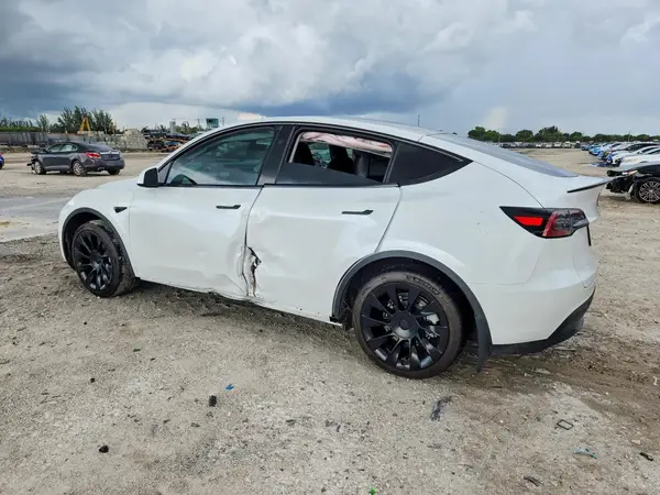 7SAYGDEE6PF854161 — 2023 Tesla Model Y, фото 2 с аукциона Copart, Боковая часть