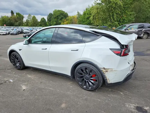 7SAYGDEF7PF778085 — 2023 Tesla Model Y, фото 2 с аукциона Copart, Задняя часть