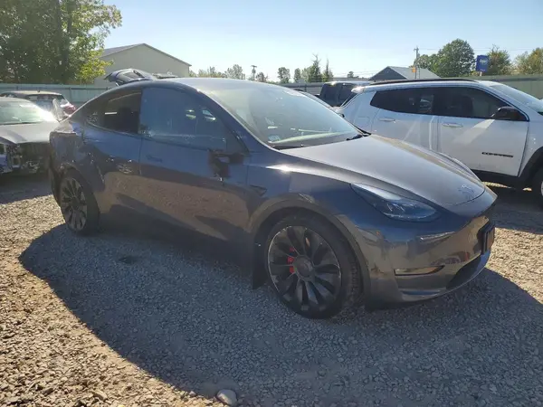 7SAYGDEF4PF904399 — 2023 Tesla Model Y, фото 4 с аукциона Copart, Боковая часть