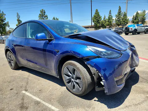 2024 Tesla Model Y VIN 7SAYGDED1RF160696 фото 4