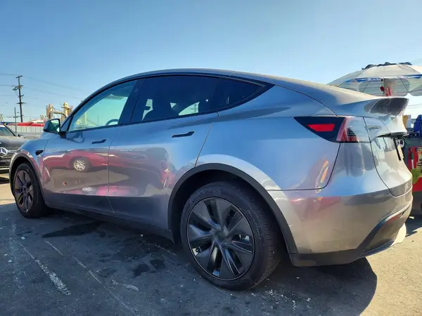 7SAYGDEE4SF287442 — 2025 Tesla Model Y, фото 2 с аукциона Copart, Боковая часть